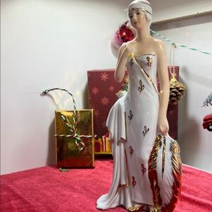 Elegant White and Gold Figurine